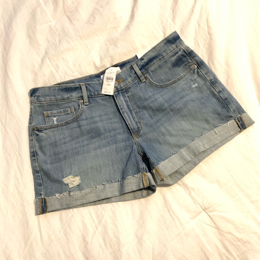 LOFT light wash distressed jean shorts
